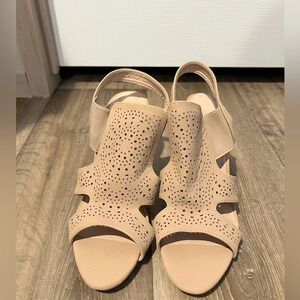 Forever size 8.5 light tan heels with elastic on the sides.